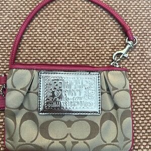 Barely used small coach coin purse.